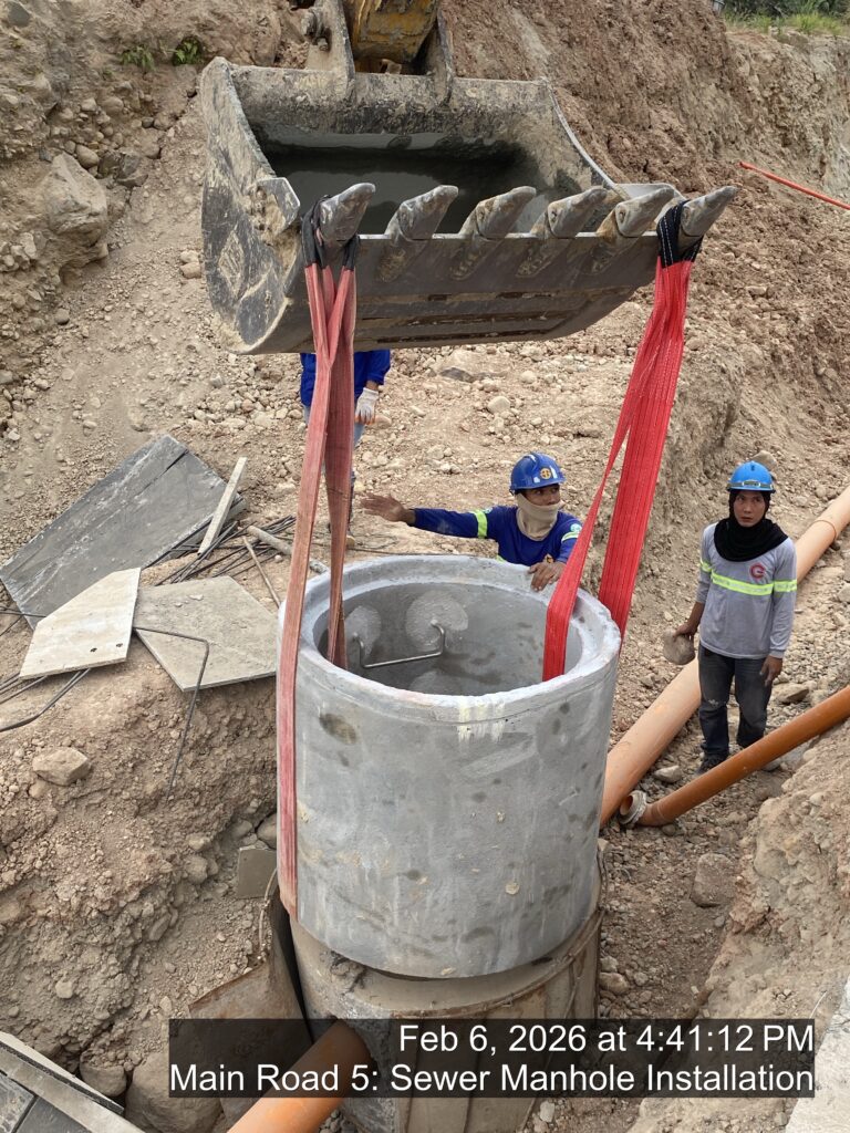 main road 5: sewer manhole installation